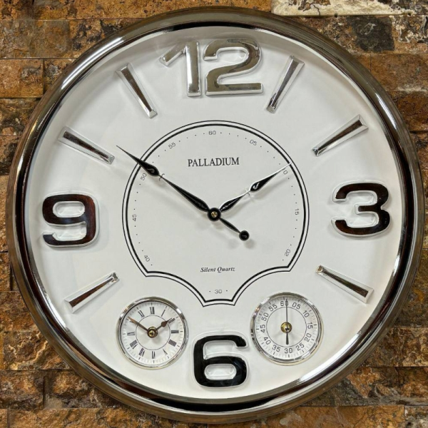 ساعت دیواری فلزی پالادیوم مدل 5320، ساعت دیواری سه موتوره سایز 55 با اعداد برجسته لاتین، ساعت دیواری شیک و متفاوت آبکاری شده با فریم فلزی، رنگ سیلور صفحه سفید