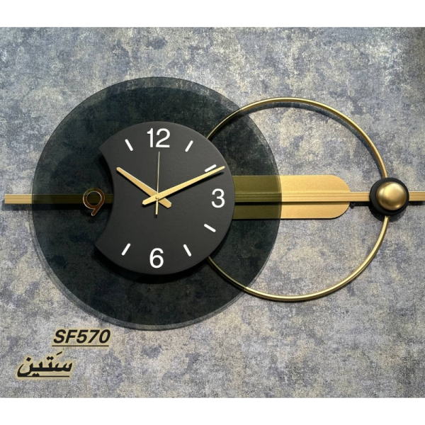 ساعت دیواری مدرن ستین SF570، ساعت دیواری با متریال فلز و چوب و شیشه، دارای طراحی مینیمال، دارای موتور آرامگرد و دو سال ضمانت، رنگ طلایی