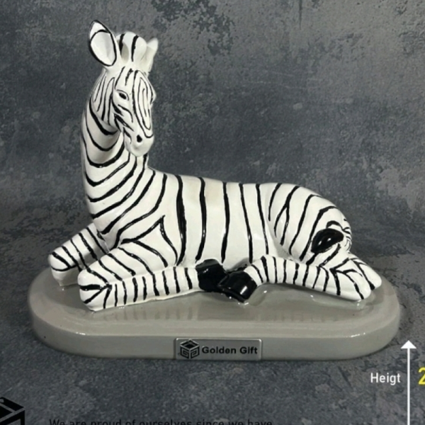 مجسمه تزیینی کد 472، مجسمه طرح گورخر نشسته آبکاری شده بسیار زیبا با سایز مناسب، ارتفاع 22 سانت