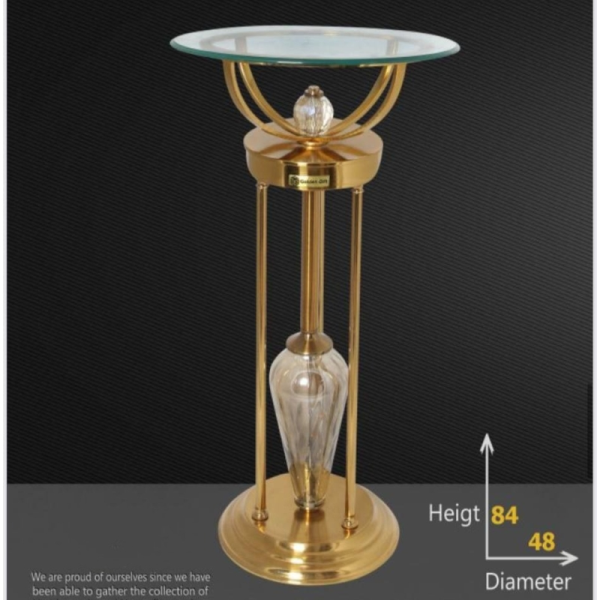 میز کنارسالنی مدل آرشیدا کد 932، میز زیبا و مدرن با متریال فلز آبکاری شده آنتیک فورتیک، طراحی ظریف و مینیمال با طراحی خلاقانه، سایز 48 سانت رویه شیشه و ارتفاع 84 سانت