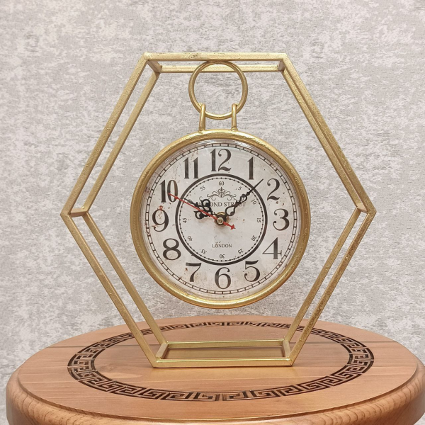 ساعت رومیزی فلزی شش ضلعی، ساعت رومیزی جدید با طراحی خلاقانه و طرح شش ضلعی، اعداد لاتین، از جنس فلز با موتور آرامگرد مناسب میز کار و میز کنسول